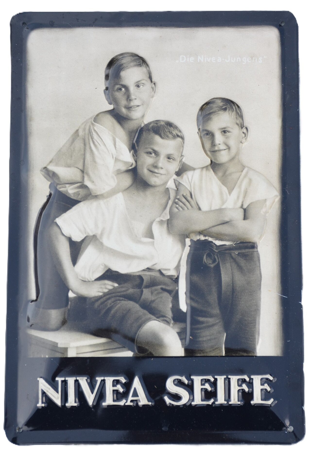 Peça histórica de publicidade de sabonete Nivea com os Nivea Boys.